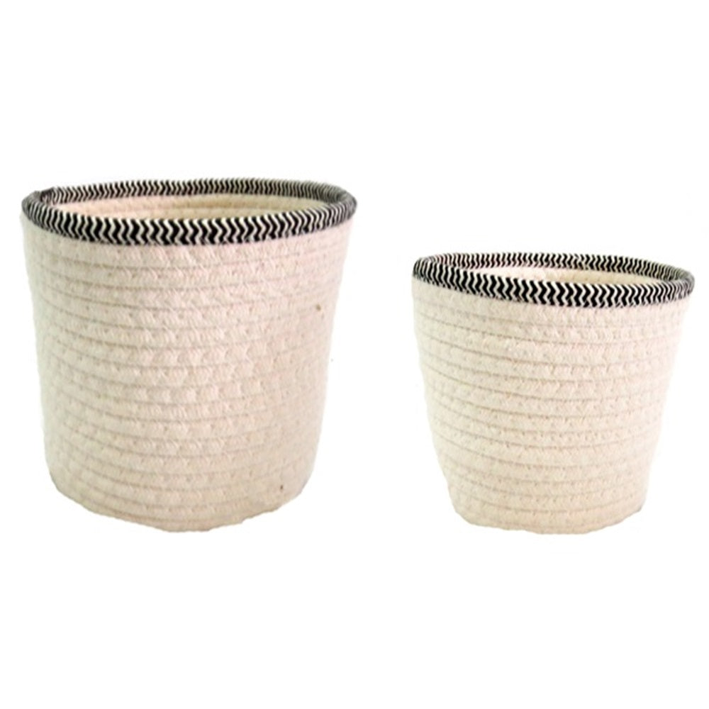 Expertly crafted from white cotton rope and accented with a sleek black and white striped border, the Rubelli Basket Set of 2 combines style and function. The larger basket measures 20 x 16 cm, while the smaller one is 17.5 cm in diameter, both offering ample storage space for your belongings. Elevate your home decor with these chic and practical baskets-unique interiors