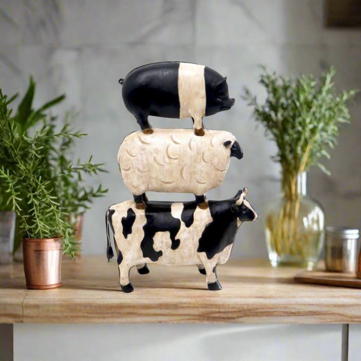 Animal Stack: Whimsical Farm Friends
Bring the charm of the countryside into your home with the delightful Animal Stack, featuring a playful trio of a cow, pig, and sheep.
Product Features:
Unique, hand-stacked design adds whimsy to any space
Durable materials ensure long-lasting enjoyment
Perfect for animal lovers and farm-themed decor
Product Details:
Material: ceramic
Color: black and off white
Create a Playful Ambiance:
Add a touch of farm life to your living room, kitchen, or office.