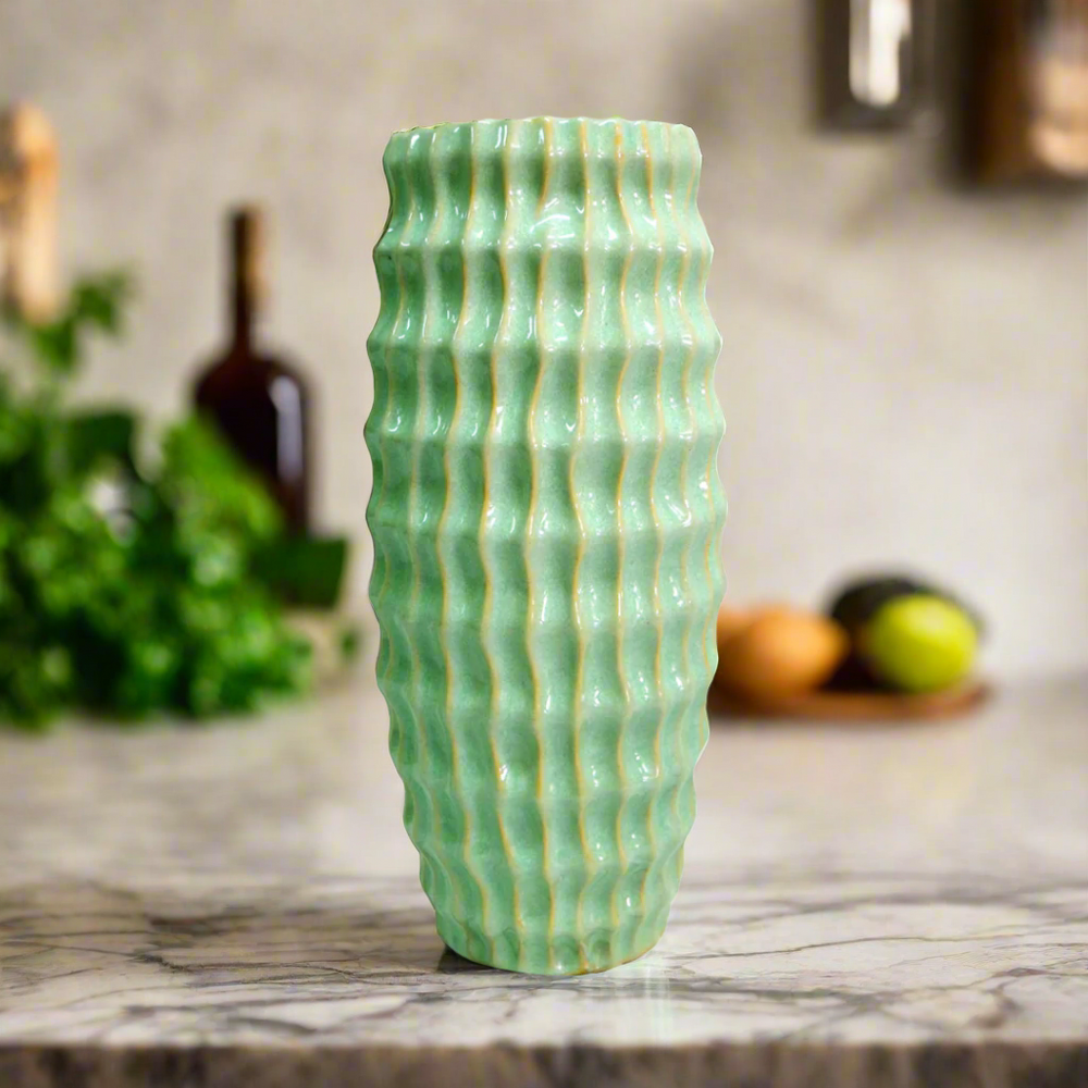 Atlantis Vase - Lime Green Ceramic Masterpiece
Elevate your space with the vibrant Atlantis Vase, a stunning ceramic piece boasting a striking lime green glaze. Its elegant design combines aesthetic appeal with functionality, perfect for adding a pop of color to any room