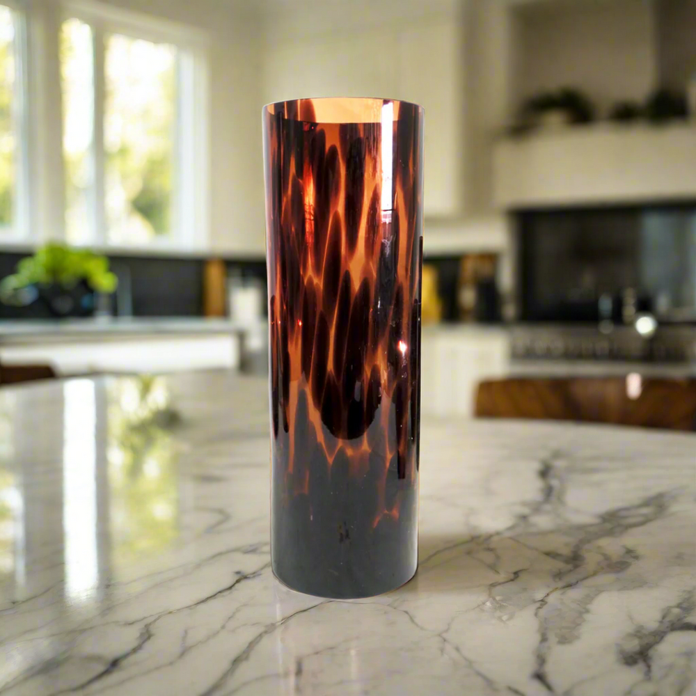 Atlas Vase - Tortoise Shell Glass Masterpiece
Elevate your space with the captivating Atlas Vase, a beautifully crafted jar container featuring a one-of-a-kind tortoise shell glass design. This stunning piece seamlessly blends style and functionality.