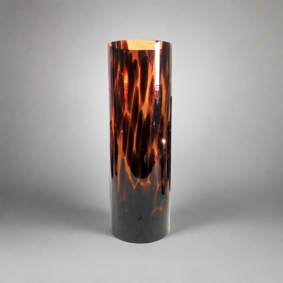 Atlas Vase - Tortoise Shell Glass Masterpiece
Elevate your space with the captivating Atlas Vase, a beautifully crafted jar container featuring a one-of-a-kind tortoise shell glass design. This stunning piece seamlessly blends style and functionality.