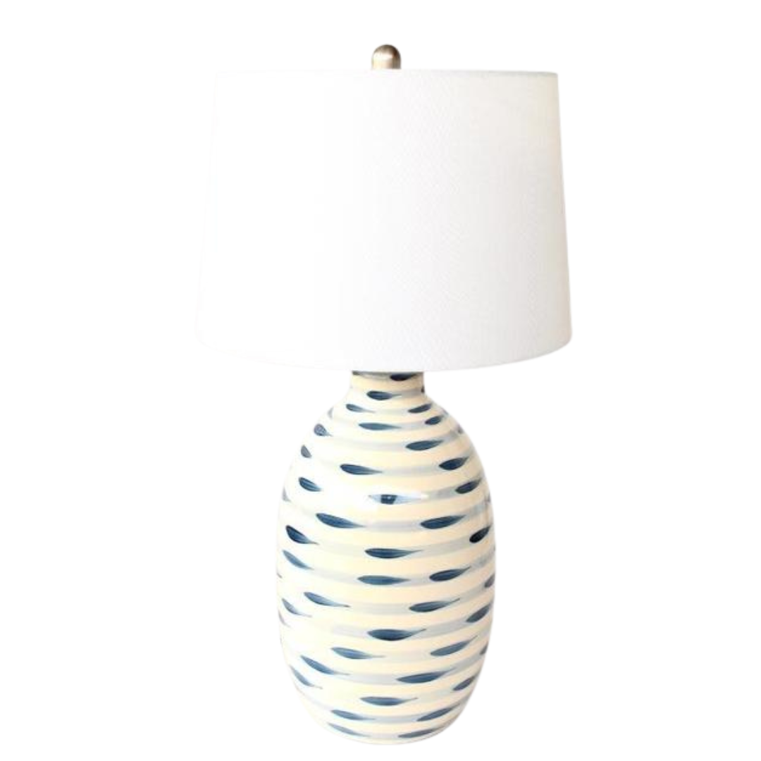 Elevate your home decor with this beautiful lamp base, featuring elegant stripes in blue and white. Topped with a white finial and harp shade, measuring 69x38cm, this lamp will add a touch of sophistication to any room. Light up your space with style and functionality.