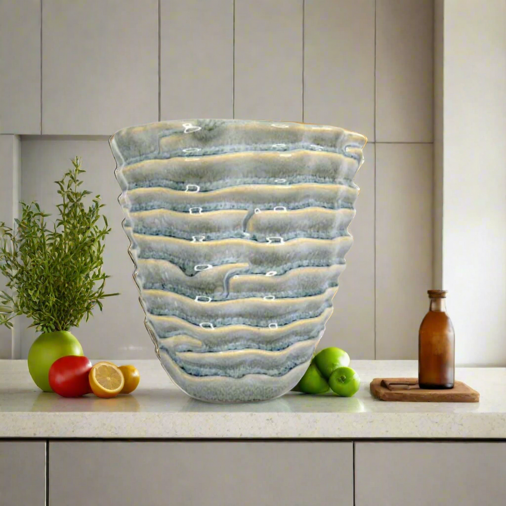 Blue Tide Pot - Elegant Home Decor from Unique Boys
Elevate Your Space with Timeless Style
Introducing the Blue Tide Pot, a masterfully crafted vessel that harmoniously balances form and function. Perfect for showcasing your favorite plants, this stunning pot adds a touch of sophistication to any room