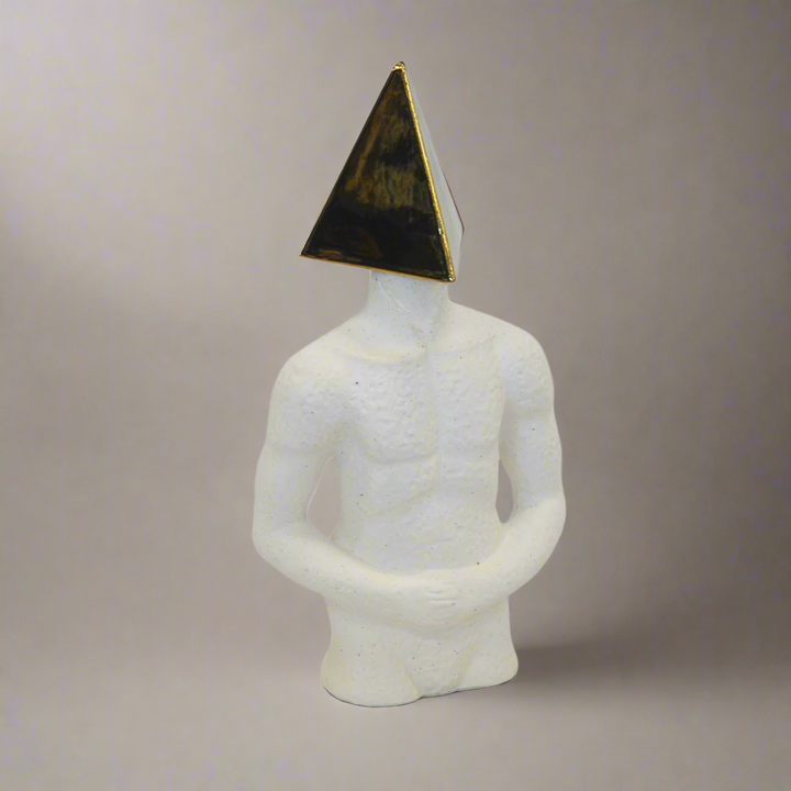 CERAMIC FIGURINE TRIANGLE HEAD (35CM H) This 35cm tall ceramic figurine features a unique triangle head design. Made from high-quality ceramic materials, it adds a touch of modern art to any space. Its sleek and contemporary design is sure to be a conversation starter and will make a stylish addition to your home decor.    Delivery 5 to 7 working days. Unique Boys