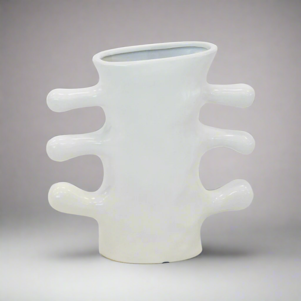 Crafted with sleek ceramic material, this white finger vase stands at 24cm tall and features a versatile 24cm x 10cm size. Enhance any space with its elegant design and perfect proportions-Unique Boys