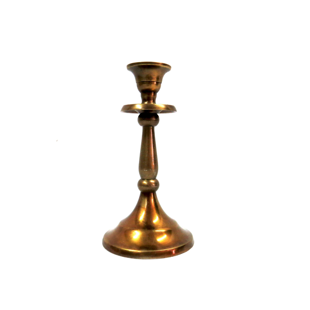 Candle Stand Brass Small
Add warmth and elegance to your space with our stunning Candle Stand Brass Small.
Sophisticated Design
Crafted from high-quality copper material
Expertly designed to securely hold tealight candles
Compact size: 19 x 10.5 x 5 cm