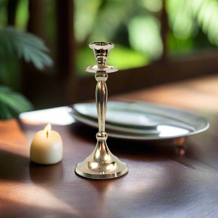 Candle Stand Silver
Elevate your home decor with our elegant Candle Stand Silver, perfect for adding a touch of sophistication to any space.
Timeless Design
Crafted from high-quality copper material (with a silver finish)
Height: 25 cm
Base: 10.5 cm diameter
Top: 5 cm diameter