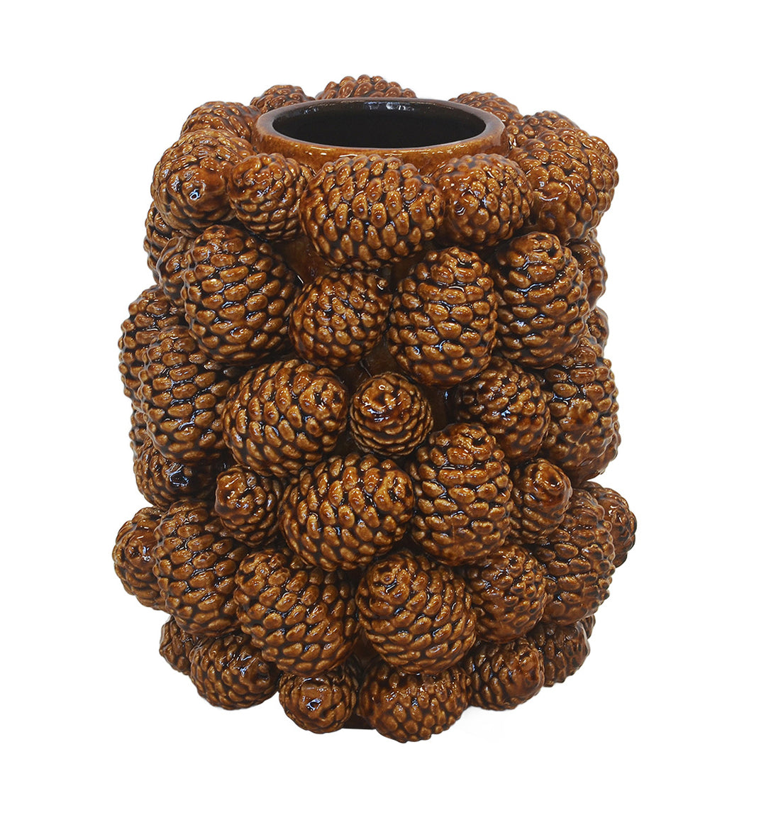 This tall brown ceramic vase features a unique pine design, adding a touch of nature to any room. Handcrafted with precision, it combines functionality with aesthetic appeal. Display your favorite flowers or greenery in this versatile and elegant vase-UNIQUE INTERIORS