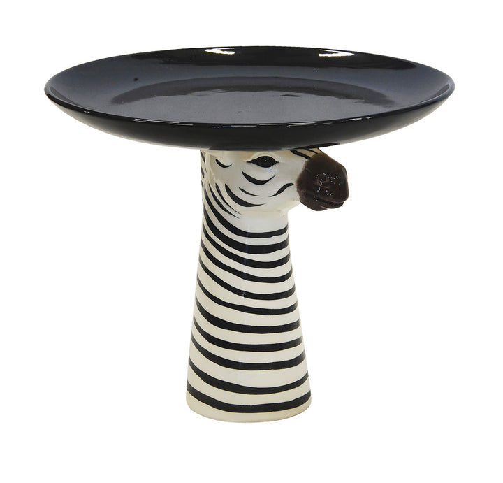 This ceramic zebra cake plate is expertly crafted at 30cm (H) and 35cm (D), making it the perfect addition to your dining collection. Its sleek design and durable material provide a stylish and functional way to showcase and serve your delicious desserts. Add a touch of elegance to any occasion with this beautiful cake plate-unique interiors