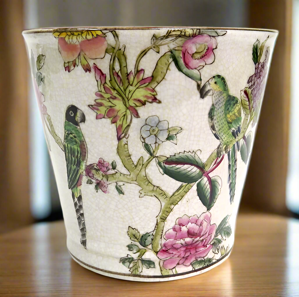 Pretty Polly Pot
Expertly crafted, the Pretty Polly Pot combines functionality with delightful design. Measuring 17cmD x 15.5cmH, this porcelain pot features a charming parrot and fruit motif. A must-have for any gardening enthusiast, bring a touch of elegance to your indoor or outdoor space.