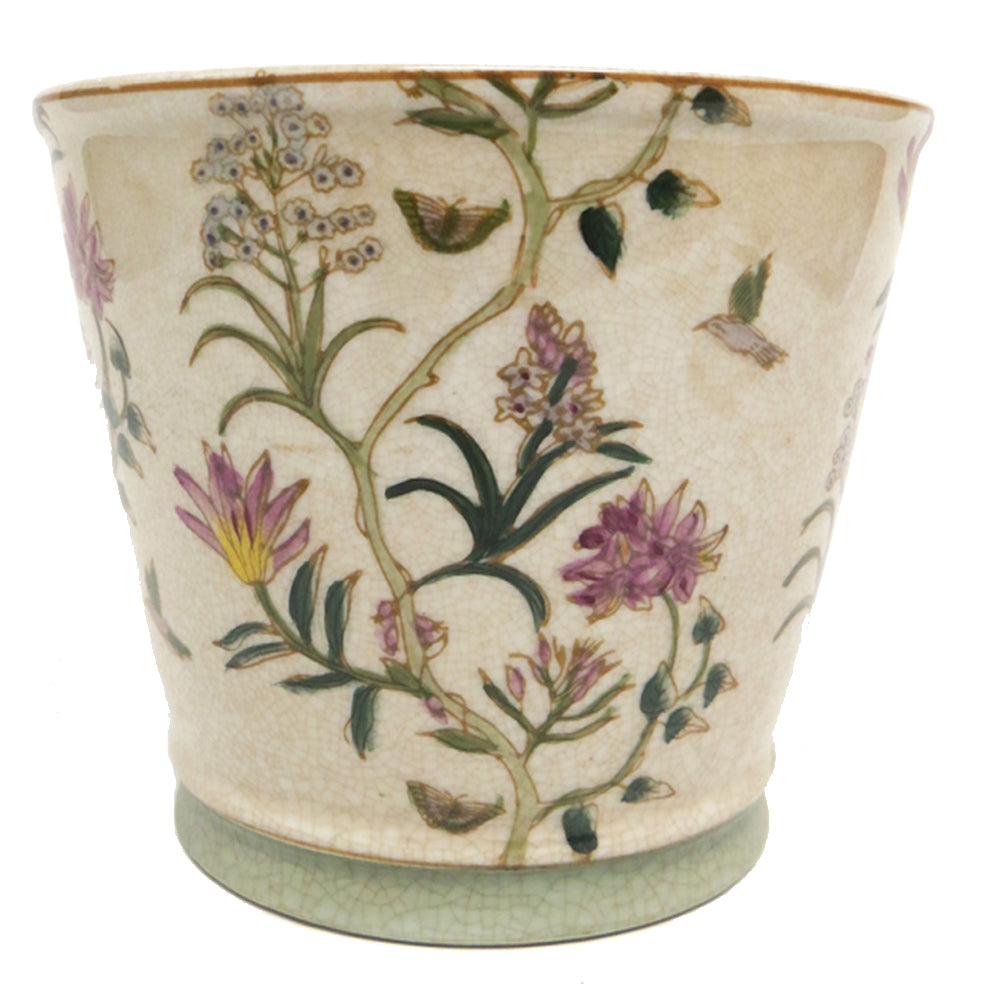 This finely crafted Needlepoint pot is perfect for livening up any space with its unique design. This pot is made with a durable fabric and ensures stability and resilience. The solid design is perfect for housing plants, flowers, and other decor items. ui