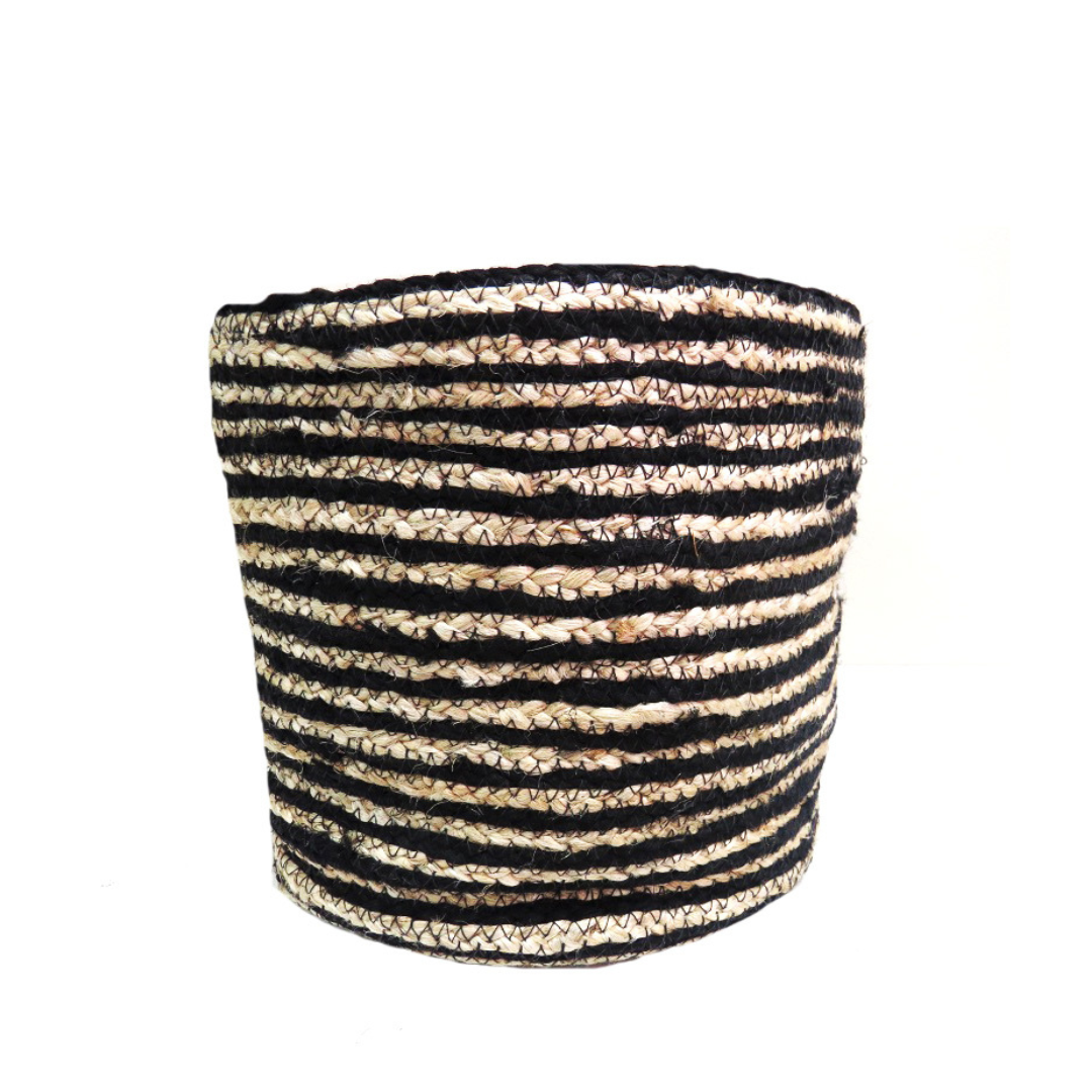 Eldan basket
Elevate your home decor with the stunning Eldan Basket, expertly hand-woven from black and natural jute in a captivating narrow stripe pattern. This masterpiece measures 27cm in diameter and 25cm in height, making it the perfect addition to any room.
A True Work of Art
Each Eldan Basket is meticulously crafted with attention to detail, ensuring a one-of-a-kind decorative piece that will leave a lasting impression. The natural jute material adds an organic and earthy feel, while the modern strip