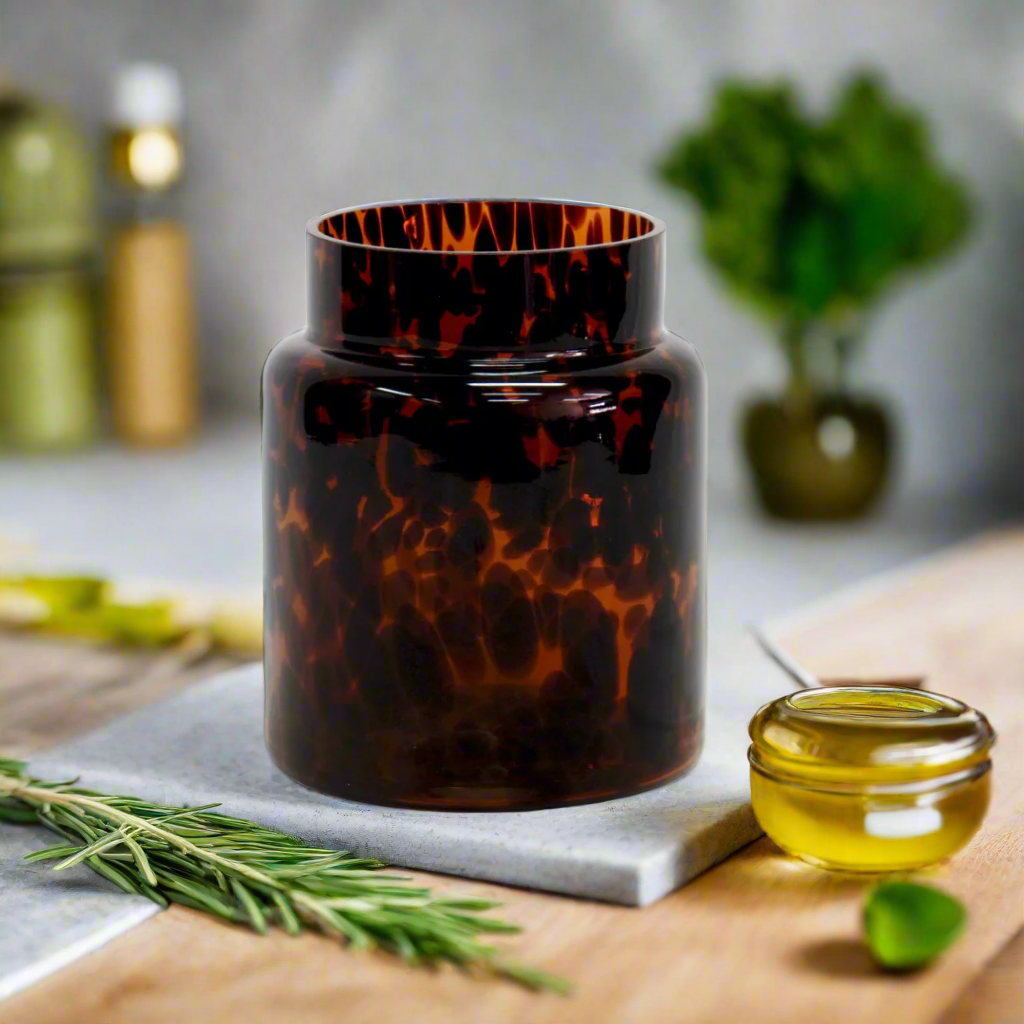 Add a Touch of Elegance with the Elemi Jar
Elevate your home decor with the stunning Elemi Jar, featuring a gloriously shaped container with a unique tortoise shell glass design.
Unique Tortoise Shell Design
This beautiful jar boasts a one-of-a-kind tortoise shell glass design that adds a touch of elegance and sophistication to any room. Its gorgeous shape and stunning design make it a perfect decorative piece for your home.
Perfect Size
The Elemi Jar has a perfect size to fit any space: