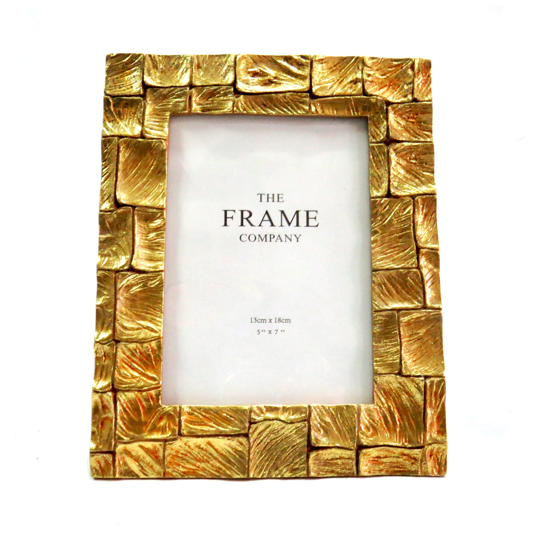 Crafted from lightweight and durable material, the Terrain Frame features a sleek 5" x 7" design perfect for displaying your favorite photos or artwork. Its modern design and sturdy construction make it the ideal choice for showcasing your memories with confidence-unique interiors