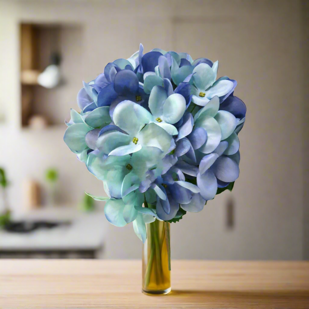 Hydrangea Blue Heaven by Unique Boys
Expertly crafted to capture the essence of real blooms, our Hydrangea Blue Heaven artificial flowers are a stunning addition to any space.
Breathtaking Details