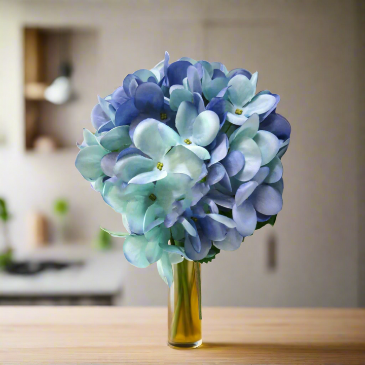 Hydrangea Blue Heaven by Unique Boys
Expertly crafted to capture the essence of real blooms, our Hydrangea Blue Heaven artificial flowers are a stunning addition to any space.
Breathtaking Details