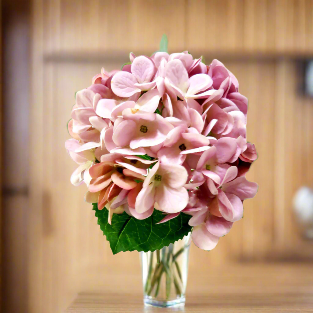 Hydrangea Lilac Milkshake by Unique Boys
Elevate your space with our stunning Hydrangea Lilac Milkshake artificial flowers, expertly crafted to capture the beauty of real blooms.
Breathtaking Details