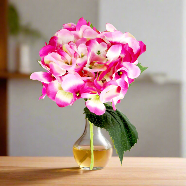 Hydrangea Raspberry Ripple by Unique Boys
Add a pop of color and vibrancy to your space with our stunning Hydrangea Raspberry Ripple artificial flowers.
Breathtaking Details