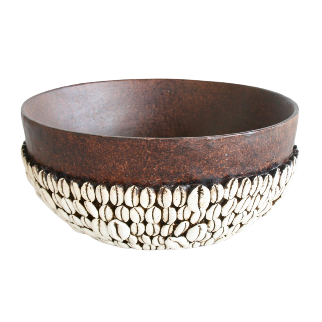 AFRICAN BOWL WITH CORIE SHELLS DESIGN 14X30CM Expertly handmade in Africa, this beautiful bowl features an intricate design of corie shells. Measuring 14x30cm, it adds a touch of African culture to any home. Support local artisans and elevate your decor with this unique piece. Unique Boys.