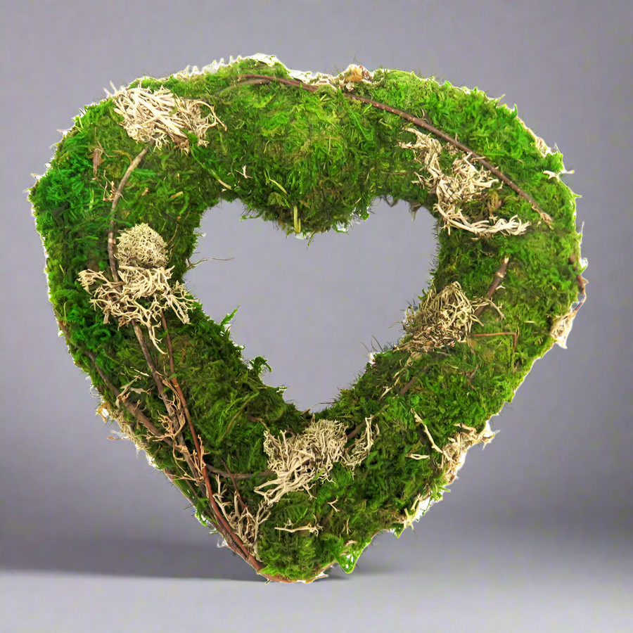 Bring the Beauty of Nature Indoors with the Moss Magic Heart
Add a touch of serenity and elegance to your space with the enchanting Moss Magic Heart. Handwoven with lush moss, delicate lichen, and intricate twigs, this double-sided heart is a masterpiece of natural art.