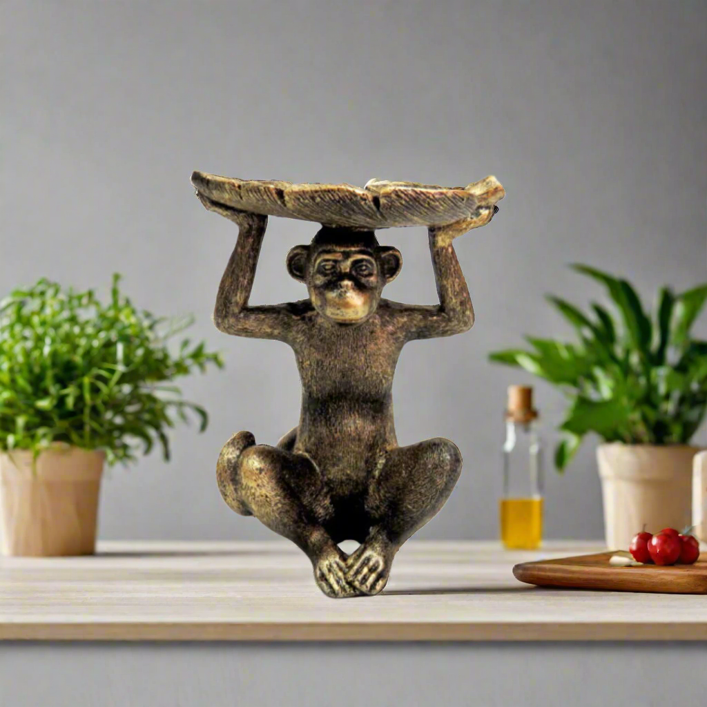 Monkey Koko: A Charming Decorative Piece
Add a touch of whimsy and elegance to your home with the Monkey Koko. This beautifully crafted decorative piece features a charming monkey holding a leaf on its head, perfect for adding a playful touch to any room.