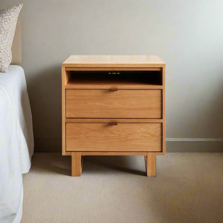 Norton Oak Pedestal

Elevate Your Bedroom with Style and Functionality
Introducing our sleek Norton Oak&nbsp;2-Drawer Bedside Pedestal, expertly crafted with high-quality sealants and finishes. Perfect for any bedroom, its compact dimensions (500W x 500D x 600H) provide ample storage without compromising on style.
Key Features: