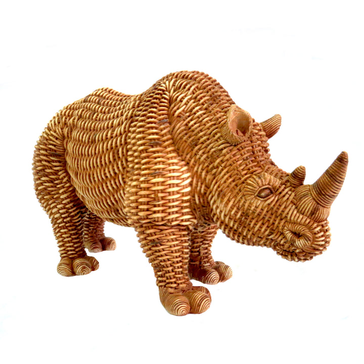 Experience the majesty of the Phoenix The Rhino. Measuring 30.5cm long and 16.5cm high, this natural-colored rhino features a stunning weave finish. With a weight of 830gms, it's a beautiful addition to any collection or décor-unique interiors