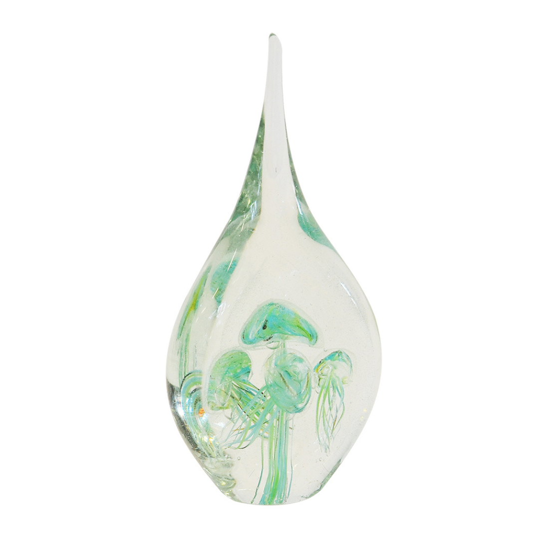 Paperweight Jellyfish Teardrop Green - 26cm
Elevate your interior space with the captivating Paperweight Jellyfish Teardrop Green, expertly crafted from hand-blown glass.
Design Features:
Size: 26cm (Height)
Unique jellyfish-inspired teardrop design
Vibrant speckled glass pattern adds a pop of color and visual interest
Hand-blown glass construction ensures a truly one-of-a-kind piece
Interior Style:
Complements modern, coastal, bohemian, and eclectic interior styles
Adds a touch of whimsy and sophistication