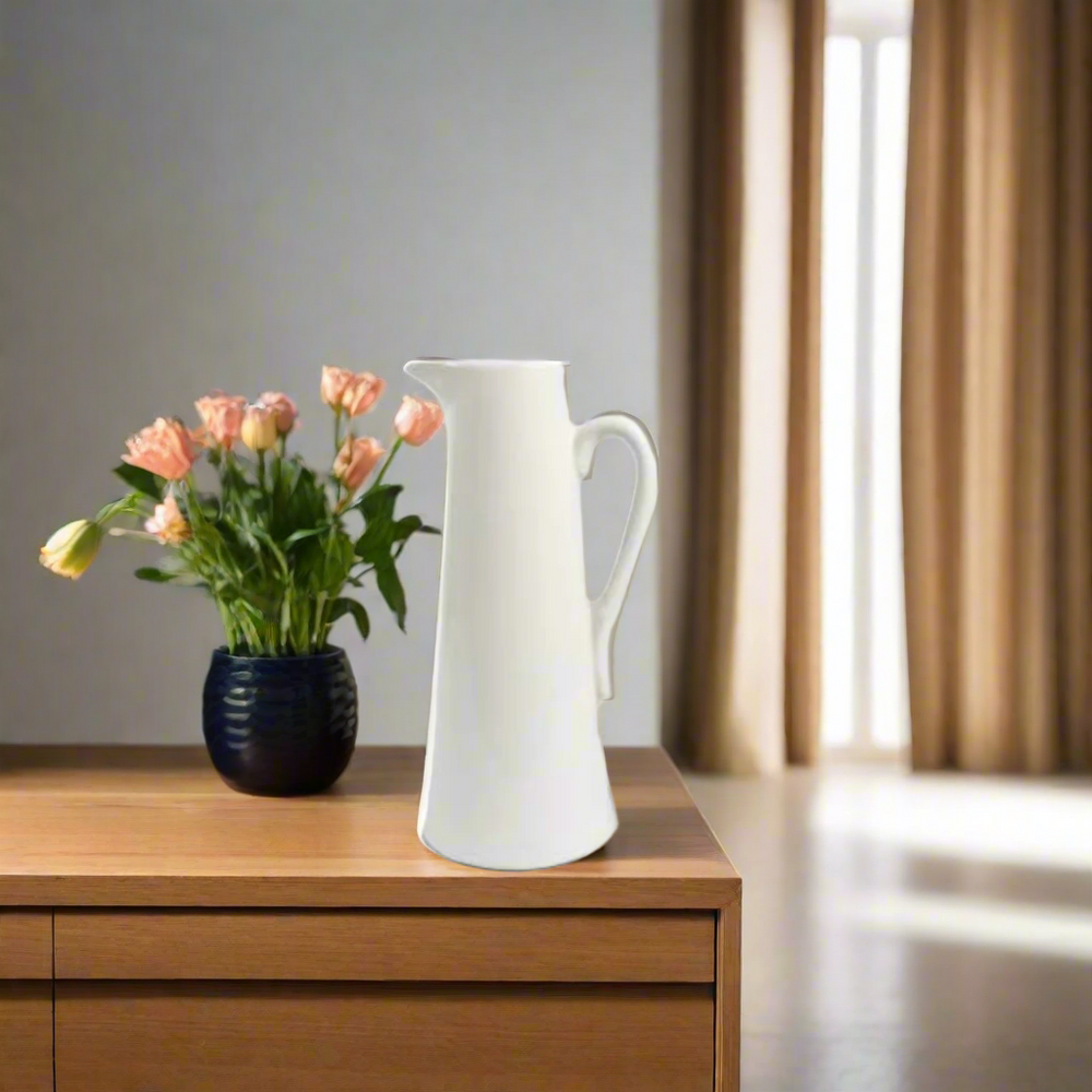 Port 3 Jug
The Port 3 Jug is a versatile and functional addition to your home decor. Measuring 11 X 8.5 X 21CM, this jug doubles as a planter, adding a touch of greenery to your space. Its sleek white design will effortlessly complement any style, making it a must-have for both practical and aesthetic purposes.