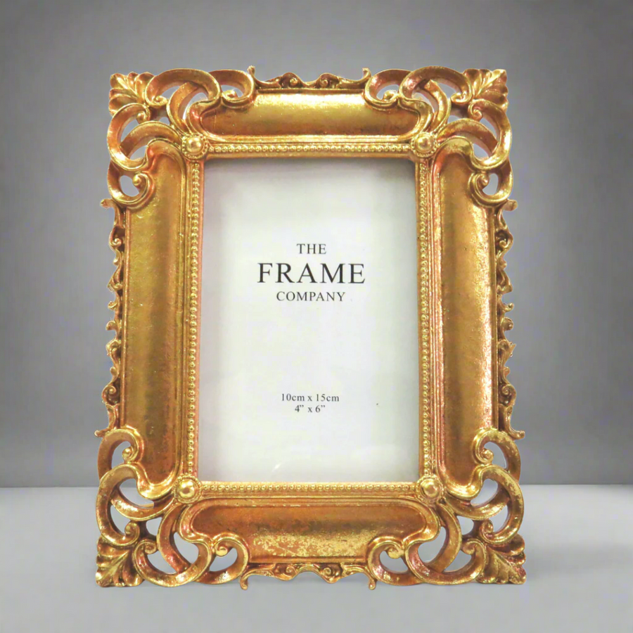 Portfolio Frame for 4"x6" Photos
Description
Elevate your cherished memories into stunning artwork with our exquisite Portfolio Frame. This 4"x6" frame boasts an antique, gold-colored finish and distinctive corner details, adding a touch of refinement to any room