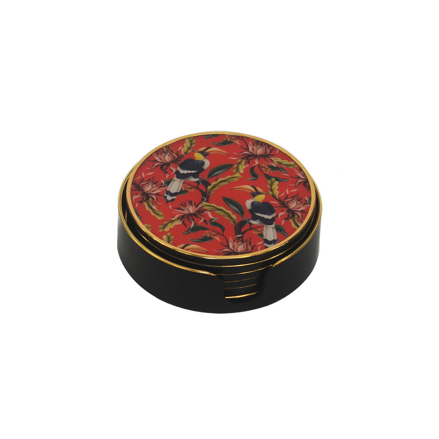 Enhance your home decor with this set of six sophisticated coasters. Constructed with premium, long-lasting material, these coasters offer exceptional protection and longevity. The eye-catching red toucan design brings a distinct flair to any dining table.  Unique Interiors.