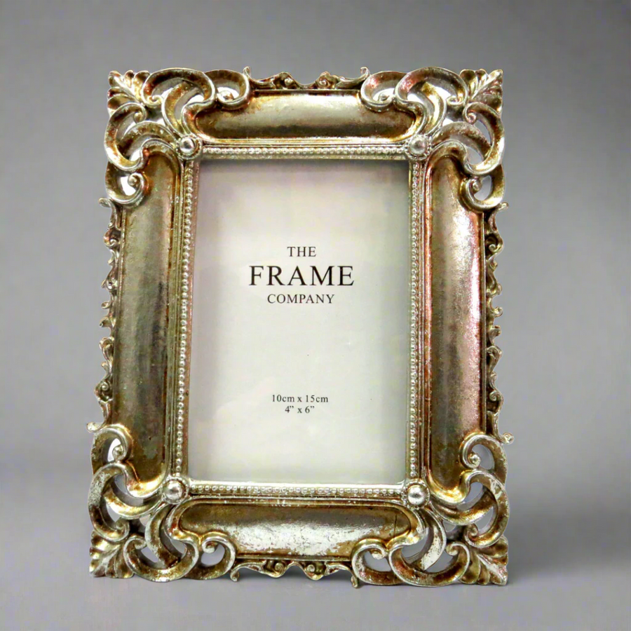 St Silver Frame
Elevate your cherished memories with our exquisite St Silver Frame. This stunning frame features an antique silver design with intricate corner detailing, adding a touch of elegance to any room.