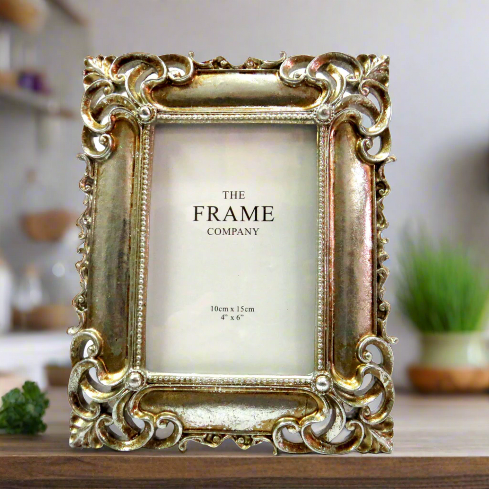 St Silver Frame
Elevate your cherished memories with our exquisite St Silver Frame. This stunning frame features an antique silver design with intricate corner detailing, adding a touch of elegance to any room.