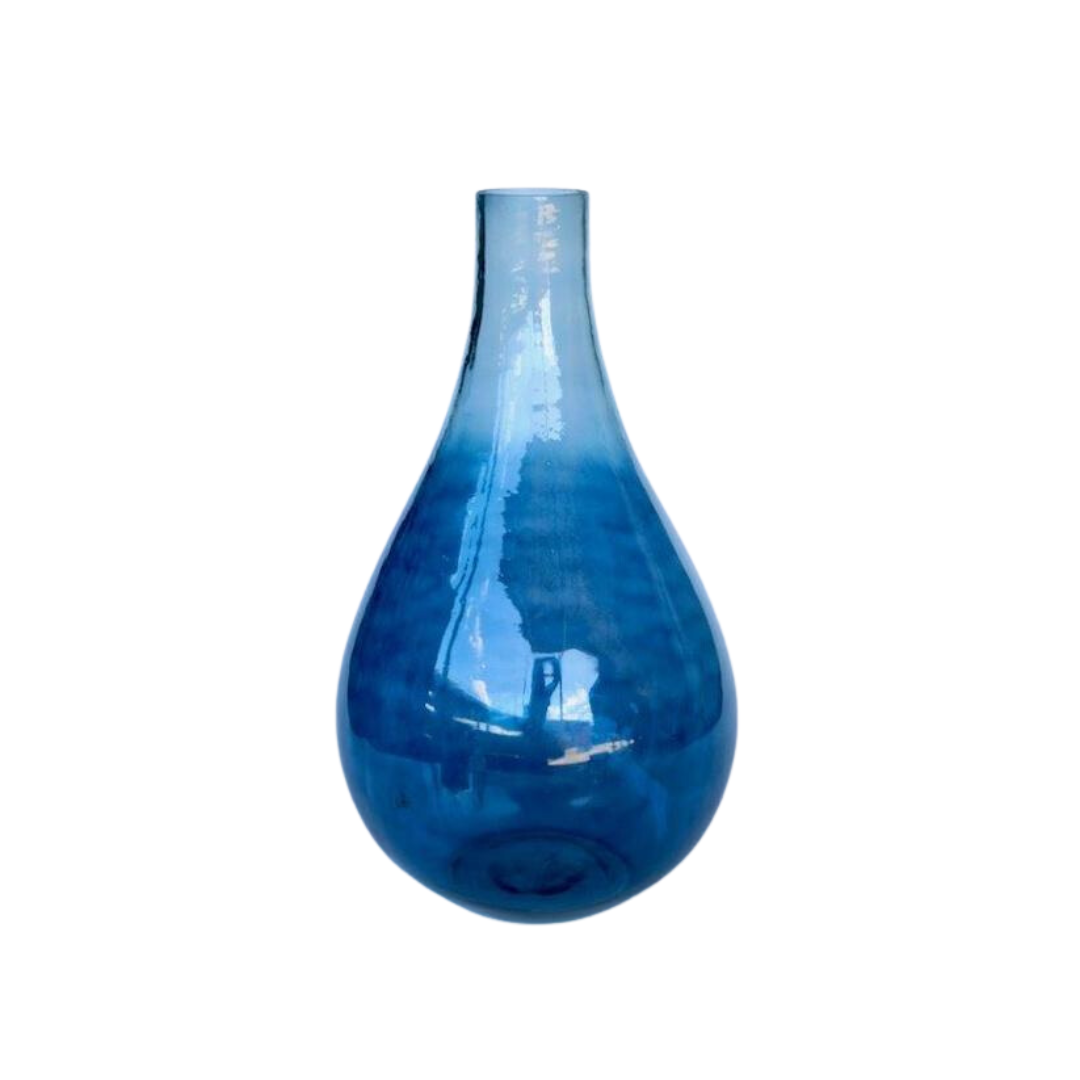 Extra large blue ombre glass vase 52X29cm  This extra large blue ombre glass vase is a beautiful decorative piece. It measures 52 cm high and 29 cm wide, making it a great addition to any home or office. The vase has an elegant ombre design, adding a stunning visual texture to any surface.  Delivery 5 - 7 working days