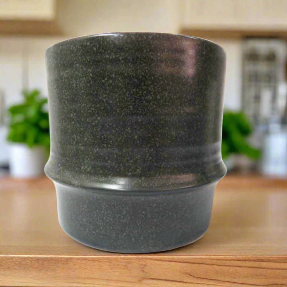 Idiom Pot - Unique, Textured Planter
Add a touch of elegance to any room with the Idiom Pot, a beautifully crafted 17cm x 15cm charcoal speckle pot. This stunning planter boasts a wonderful texture and is designed for optimal functionality and aesthetics, providing ample space for your plants