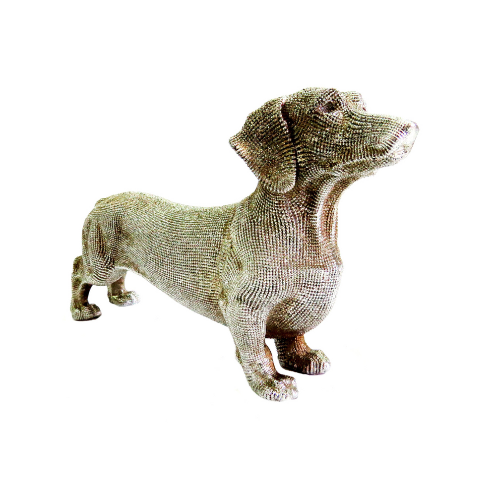 Unique Boys
Coco Sausage Dog
Silver Sausage Dog Figurine
Bring a touch of whimsy and elegance to your space with our charming Coco Sausage Dog.
Key Features
Material: High-quality silver for a luxurious finish
Dimensions: 24.5cm length x 14.5cm height
Weight: 310gms for substantial quality feel
Perfect for
Dog lovers and collectors
Adding a touch of elegance to shelves, mantels, or coffee tables
Gift-giving for special occasions
Stylish and Sophisticated
