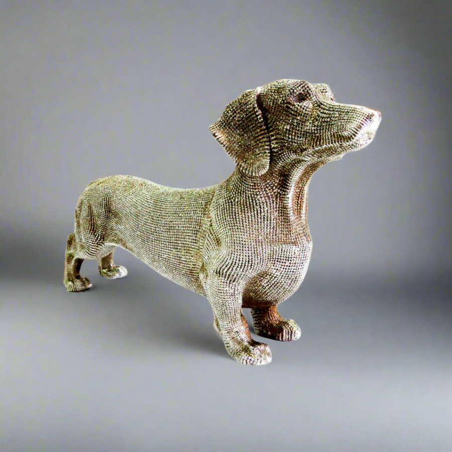 Unique Boys
Coco Sausage Dog
Silver Sausage Dog Figurine
Bring a touch of whimsy and elegance to your space with our charming Coco Sausage Dog