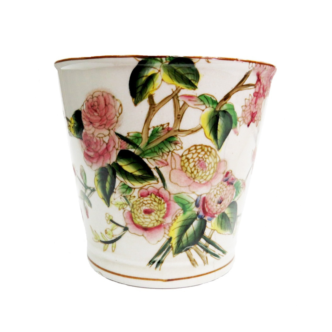 As a product expert, I highly recommend the Pink Camellia Pot. Its dimensions of 17CMD x 15.5CMH make it perfect for displaying your plants. The combination of pink and green colors makes it a beautiful addition to any space, while its popular design adds a feminine touch. Don't miss out on this gorgeous planter.UNIQUE INTERIORS.