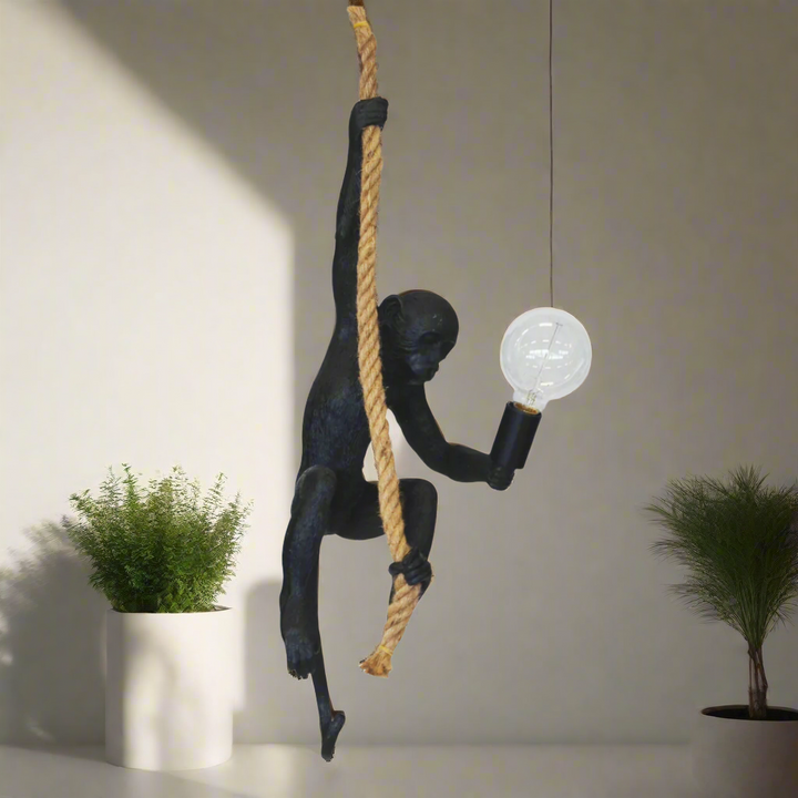 Resin monkey on rope black