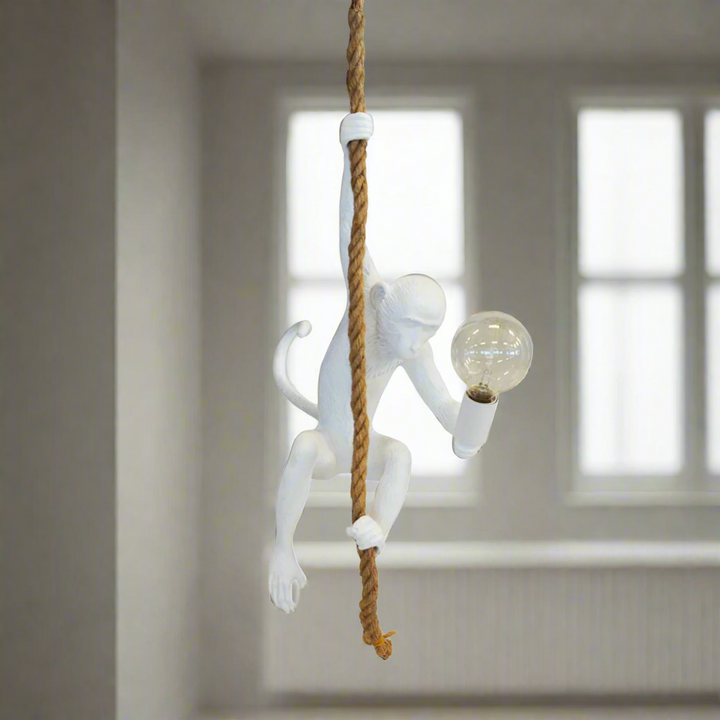 Resin monkey on rope white