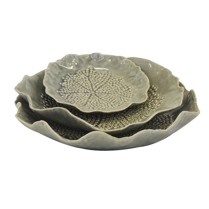 Enhance your home decor with this stunning Ceramic Petal Plate Grey Set of 3. This 3-piece set comes with different sizes: 28CM X 28CM Large, 25CM X 25CM Medium and 17CM X 17CM Small. Perfect for unique home interiors, these plates feature beautiful flower petal designs. Add a unique touch to any room today.  Ceramic Petal Plate Grey Set of 3  Size  28CM X 28CM Large  25CM X 25CM Medium  17CM X 17CM Small  Flower petal plates are perfect for any home. interior decor  Unique Interiors 