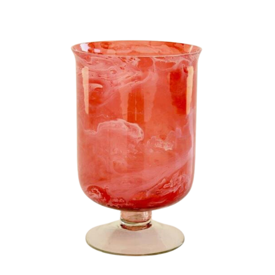 A unique Cranberry glass candle holder with a 20x13cm foot is designed to add a touch of elegance to any space. This product is crafted from recycled glass, and will provide long-lasting beauty. It has a size of 20x13cm.  Can be delivered in 5 to 7 days.