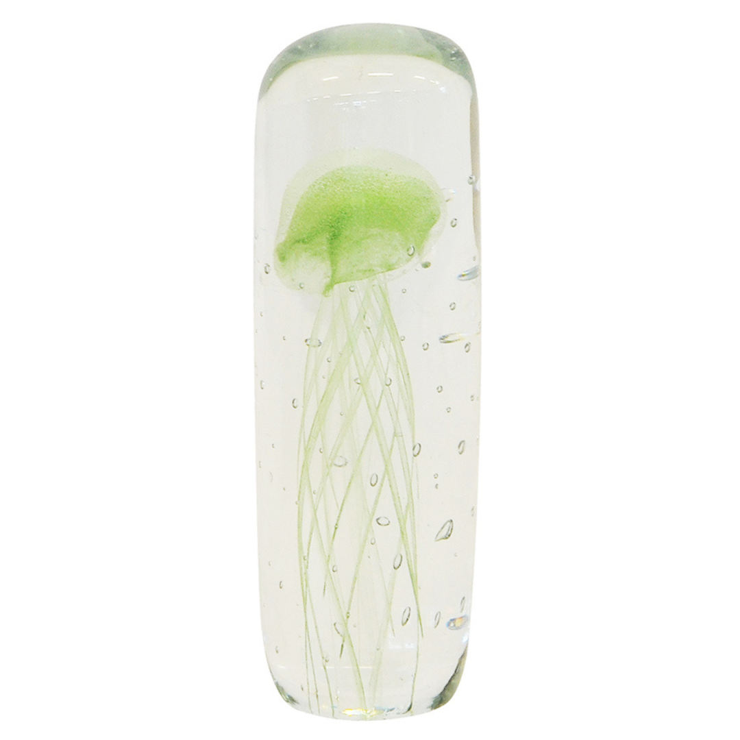 This Paperweight Jellyfish Cylinder Mint 18cm offers a unique and stylish touch to any interior space. The attractive speckled glass lends a contemporary feel and complements existing decor. Its 18cm size and aquarium-like interior make it perfect for the modern home or office.  Paperweight jellyfish cylinder mint 18cm  A beautiful speckled glass paperweight. interior decor  Unique Interiors 