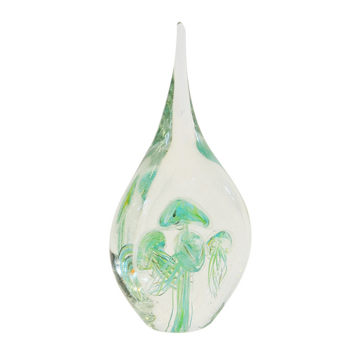 This 26cm paperweight jellyfish-shaped teardrop is sure to give any interior a beautiful and unique accent. Crafted from hand-blown glass, it features a colorful speckled pattern, perfect for any decor. Adds a unique touch to any space.  Paperweight jellyfish teardrop green 26cm  A beautiful speckled glass paperweight. interior decor  Unique Interiors 