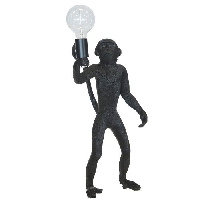 This resin monkey standing black is 55CM tall and is perfect for ornamental lighting. Its beautiful black finish provides a unique look for your interior decor, and is sure to be a talking point in any home. Whether you need an eye-catching ornamental piece or a quirky lighting fixture, this is the piece for you.  Resin monkey standing gold  55CM (H)  Beautiful standing black monkey light.  A lovely addition to any home. Interior Decor Piece.  Ornamental lighting. Beautiful standing black monkey light.
