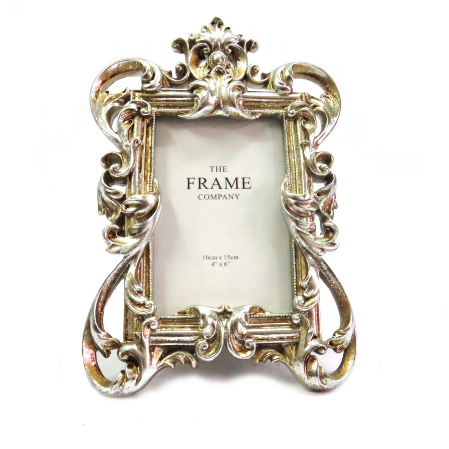 The Victora Frame features a silvery gold color and can hold a 4" x 6" photo. Made with high-quality materials, this frame adds a touch of elegance to any home decor. Preserve your memories with this beautiful and durable frame-unique interiors