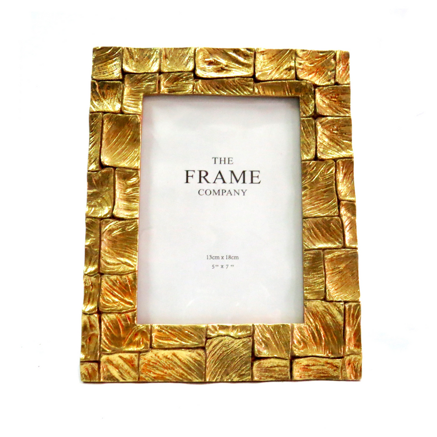 Crafted from lightweight and durable material, the Terrain Frame features a sleek 5" x 7" design perfect for displaying your favorite photos or artwork. Its modern design and sturdy construction make it the ideal choice for showcasing your memories with confidence-unique interiors