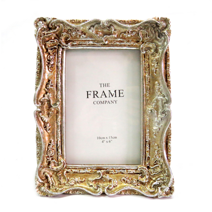 This Tintoretto Frame measures 4" x 6" and is perfect for displaying your favorite memories. Its compact size makes it versatile and suitable for any space. Crafted with high-quality materials, it offers a sleek and elegant design that will enhance any home decor. Preserve your cherished moments with this stylish frame-unique interiors