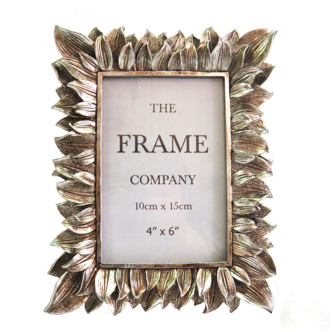 The Petals Frame is the perfect way to showcase your cherished memories. With an opening of 4" x 6" or 10cm x 15cm, it accommodates standard photo sizes. Its sleek design, measuring 18cm x 22.2cm, makes for a lightweight and elegant addition to any room. Crafted in silver, this frame weighs 540g for a secure and polished display-unique interiors