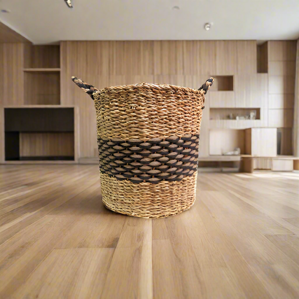 Product Details: Pharo Basket
Description: A stunning and chunky basket made from a combination of seagrass and jute, featuring a striking natural and black colorway.
Material: Seagrass and jute
Size: 35cm diameter x 35cm height
Features:
Handles for easy carrying
Chunky and beautifully made design
Natural and black colorway
Uses:
Home decor: Add a touch of natural elegance to your living room, bedroom, or kitchen.
Storage: Perfect for storing books, magazines, or other small items.
Store: Unique Boys, offe